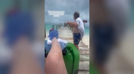 Swimmer films herself moments after she was bitten on her foot by SHARK in Florida