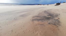 Storm Eunice batters Exmouth beach with 80mph winds but the sun keeps shining