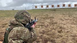Soldiers MOD UK training in snowy conditions live firing ranges
