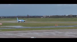 Thomson airliner takes off from Birmingham airport in the sunshine