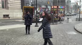 Snow squall gusts through New York City, bringing highs winds and flurries