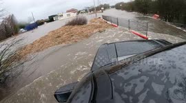 Lucky escape for driver taking on flooded roads in Yorkshire, UK, during Storm Franklin