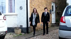 UK siblings kept in isolation to protect their father return to school after 14 MONTHS