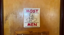 A funny bathroom sign at a local restaurant in Florida reflecting the times!!