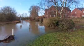 Flooded street as an aftermath of storms in Derby, UK