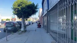 Rabbi getting in to the spirit of the Superbowl in a very musical and party worthy mobile mobility car on Superbowl Sunday in Los Angeles