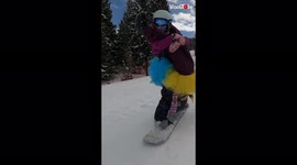 Snowboarding sisters take 'trust game' to daring new level