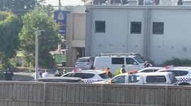 Trains cease as police shut off streets near Ringwood station, Melbourne