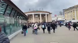 Kyiv citizens flee to underground bunker as air raid sirens blare on Friday morning