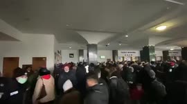 Kyiv citizens flee to underground bunker as air raid sirens blare on Friday morning