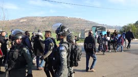 Palestinian students take part in a protest against the daily attacks by Israeli settlers and soldiers on them, in al-Lubban al-Sharqiya village, south of Nablus.