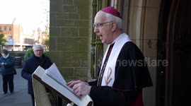 Catholic bishop holds vigil for Ukraine on steps of church in Wrexham