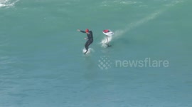 Hydroblade surfer towed by jet ski on dangerous 'Cribbar' waves in Cornwall