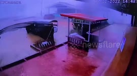 Strong winds batter Covid-19 field hospital wall during storm in Thailand