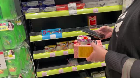 Hong Kong residents empty pharmacies of painkillers as COVID surges