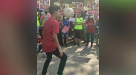 Talented teen does football freestyle tricks at protest rally against military coup in Myanmar
