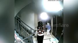 Woman wearing face pack runs out flat to extinguish neighbour's fire in China