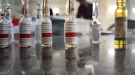 Shot of adrenaline drug ampoules with atropine in the back in a hospital setting shot by a doctor
