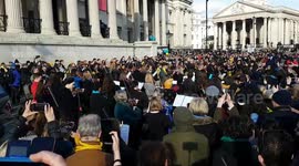 An orchestral flashmob at Trafalgar Square plays in solidarity with Ukrainians