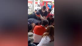 Bargain hunters fight for cheap designer clothes at shop sale in the Philippines