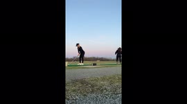 Woman snaps golf club in half at driving range in the USA