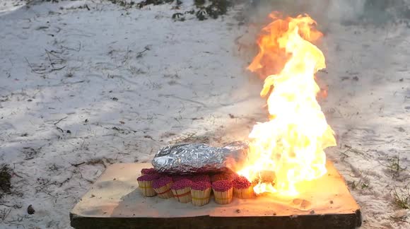 YouTuber attempts to cook sausages on bed of 12,000 matches