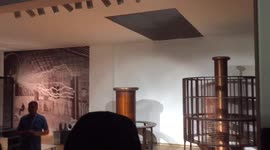 A Person in Museum of Nikola Tesla showing how lightnings and electricty is working on high woltage!