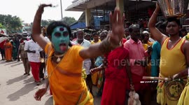 Graphic video shows devotees devouring live chickens at festival in southern India