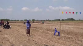 Farmers race each other on modified carts made from tractor engines after harvest
