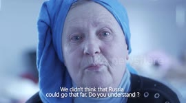 Elderly Ukrainian woman tells of disbelief and determination after escape from war