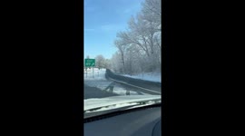 Driving on a highway after a snow stormed dropped snow on March 10,2022