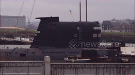 Ex-Russian submarine displays Ukrainian flag off Kent, UK