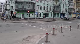 Northern Irish couple walk through Kyiv leaving food for stay animals as air raid sirens sound