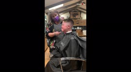 Boy with Down syndrome can't contain excitement while having eyebrows waxed