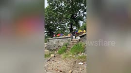 Two brave locals jump into sea to rescue drowning boy in Indonesia