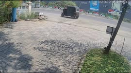 Terrifying moment two police officers narrowly escaping a speeding car