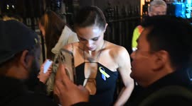 Jessica Plummer signs for fans when leaving the Vogue and Tiffany BAFTA after party at Annabell's