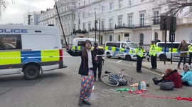Protesters gather to support activists occupying a Russian oligarch’s house in London