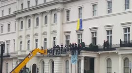 Police use cherry picker in attempt to remove occupiers from Russian oligarch's London home