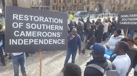 Ambazonia Cameroon protest at Empire day service Westminster Abbey