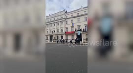 Oligarch's £5 million central London mansion occupied by squatters who fly Ukrainian flag from the window