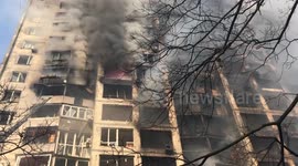 Russian air strikes hit residential buildings in Kyiv killing at least two