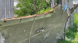 Huge chunk of aircraft fuselage found on Thai beach conjures memories of missing flight MH370
