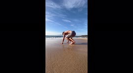 Handstand in Corsica at the beach île de beauté