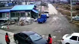 Chinese motorist knocks over volunteer attempting to prevent him from leaving village amid COVID-19 resurgence
