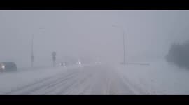 Watch as winter keeps a firm grip of Iceland as huge snowstorm hits Reykjavik during the rush hour