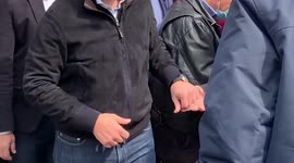 Penniless moment: Former Greek PM Alexis Tsipras ran out of cash in his attempt to leave a tip to street musicians