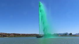 Giant fountain turns GREEN for St Patrick's Day in Arizona town