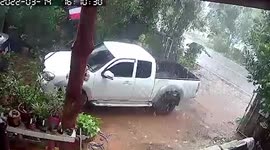 Strong wind rattles home during powerful storm in Thailand