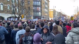 Protesters chant “We do not consent” outside Stoke Newington Police Station